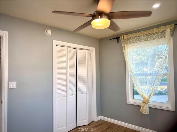 a view of front door and bedroom