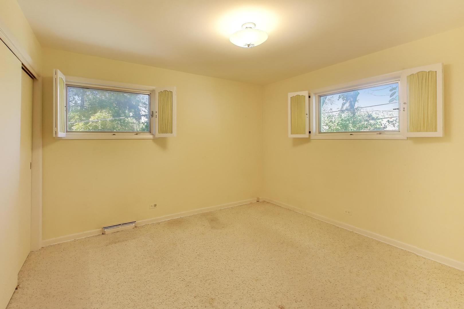 313 Ferndale Road Glenview, IL 60025 - Photo 12 of 22 an empty room with a window