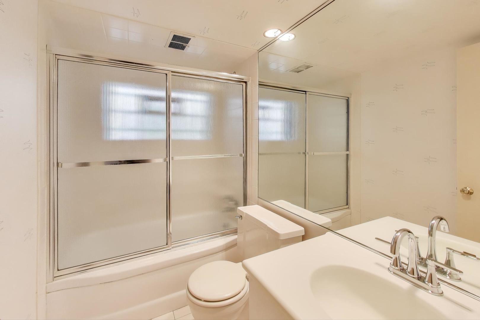 313 Ferndale Road Glenview, IL 60025 - Photo 14 of 22 a bathroom with a sink toilet and shower