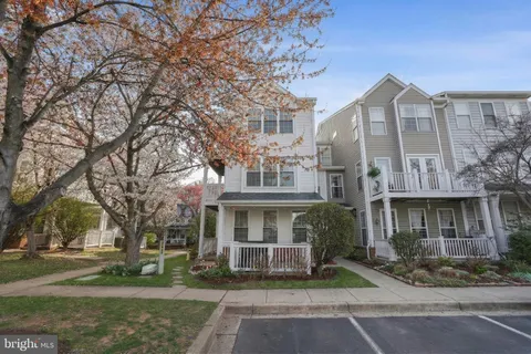 a view of a building with a yard