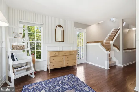 a room with furniture and a window
