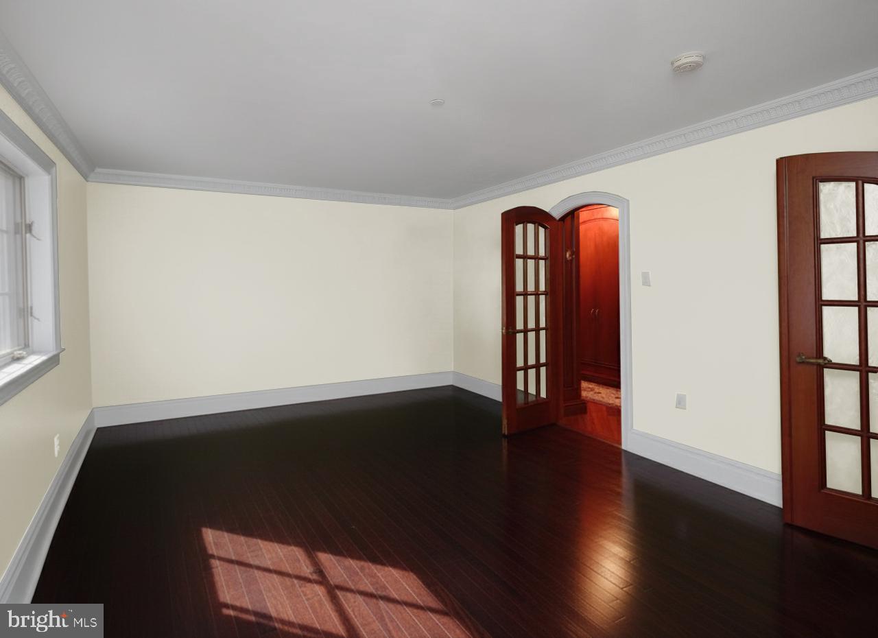 34 West Mechanic Street New Hope, PA 18938 - Photo 18 of 39 a view of an empty room with wooden floor and a window