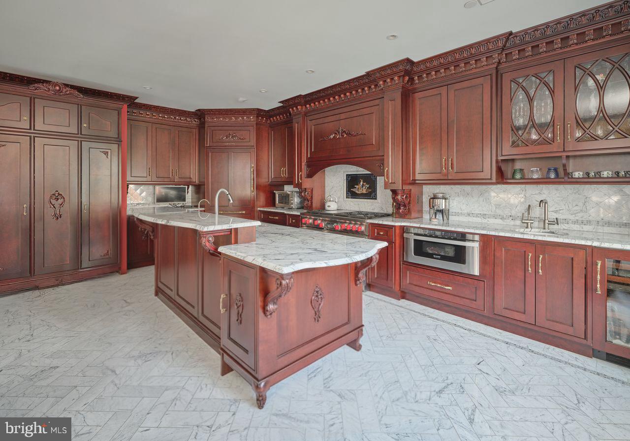 34 West Mechanic Street New Hope, PA 18938 - Photo 3 of 39 a kitchen with stainless steel appliances granite countertop a stove a sink a refrigerator and cabinets