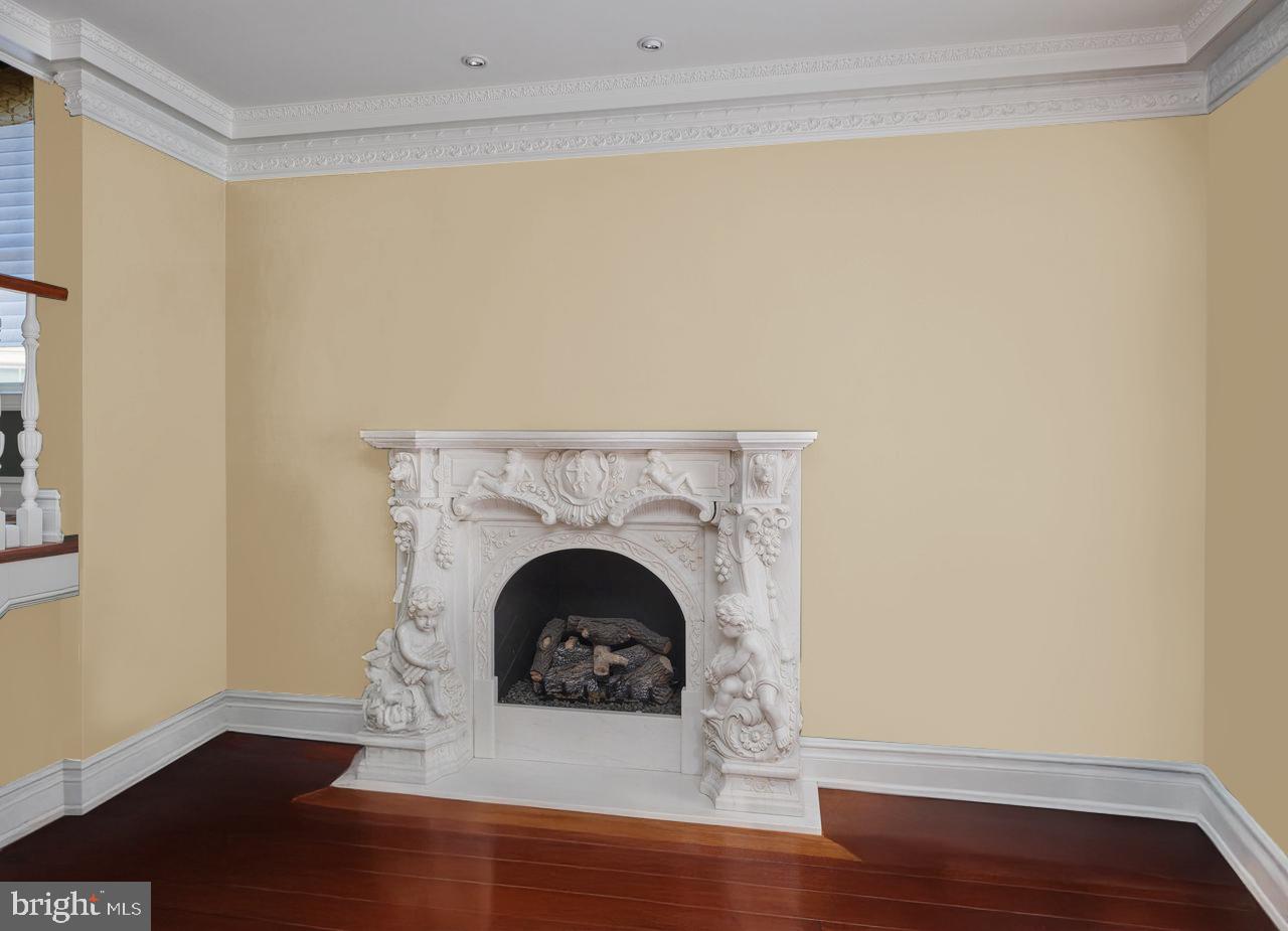 34 West Mechanic Street New Hope, PA 18938 - Photo 10 of 39 a room with a fireplace and a rug