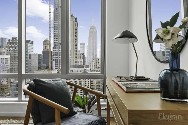 a view of a workspace with a couch