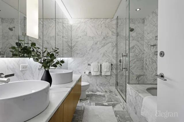 a view of a city with tall buildings