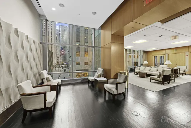 a living room with a couch and a flat screen tv