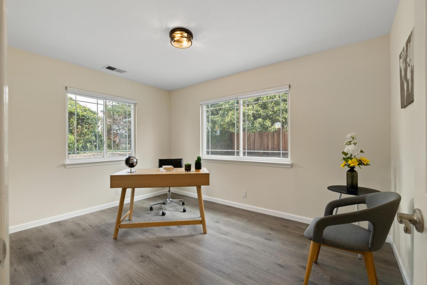 227 Lippert Avenue Fremont, CA 94539 - Photo 16 of 25 a room with a table and windows