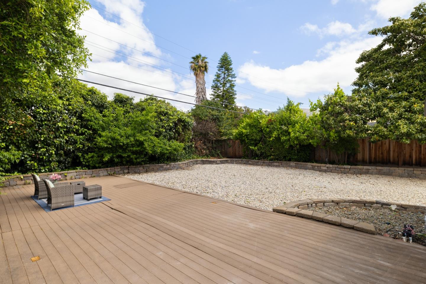 227 Lippert Avenue Fremont, CA 94539 - Photo 20 of 25 a street view with large trees