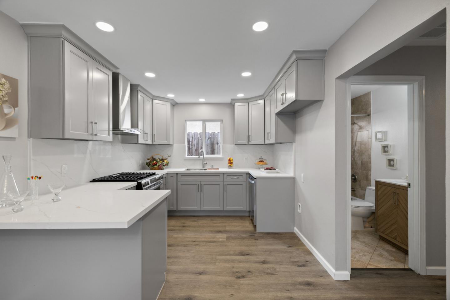 227 Lippert Avenue Fremont, CA 94539 - Photo 10 of 25 a kitchen with a sink cabinets and stainless steel appliances
