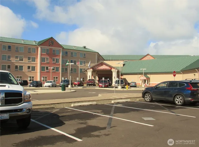a view of a cars parked in front of a building