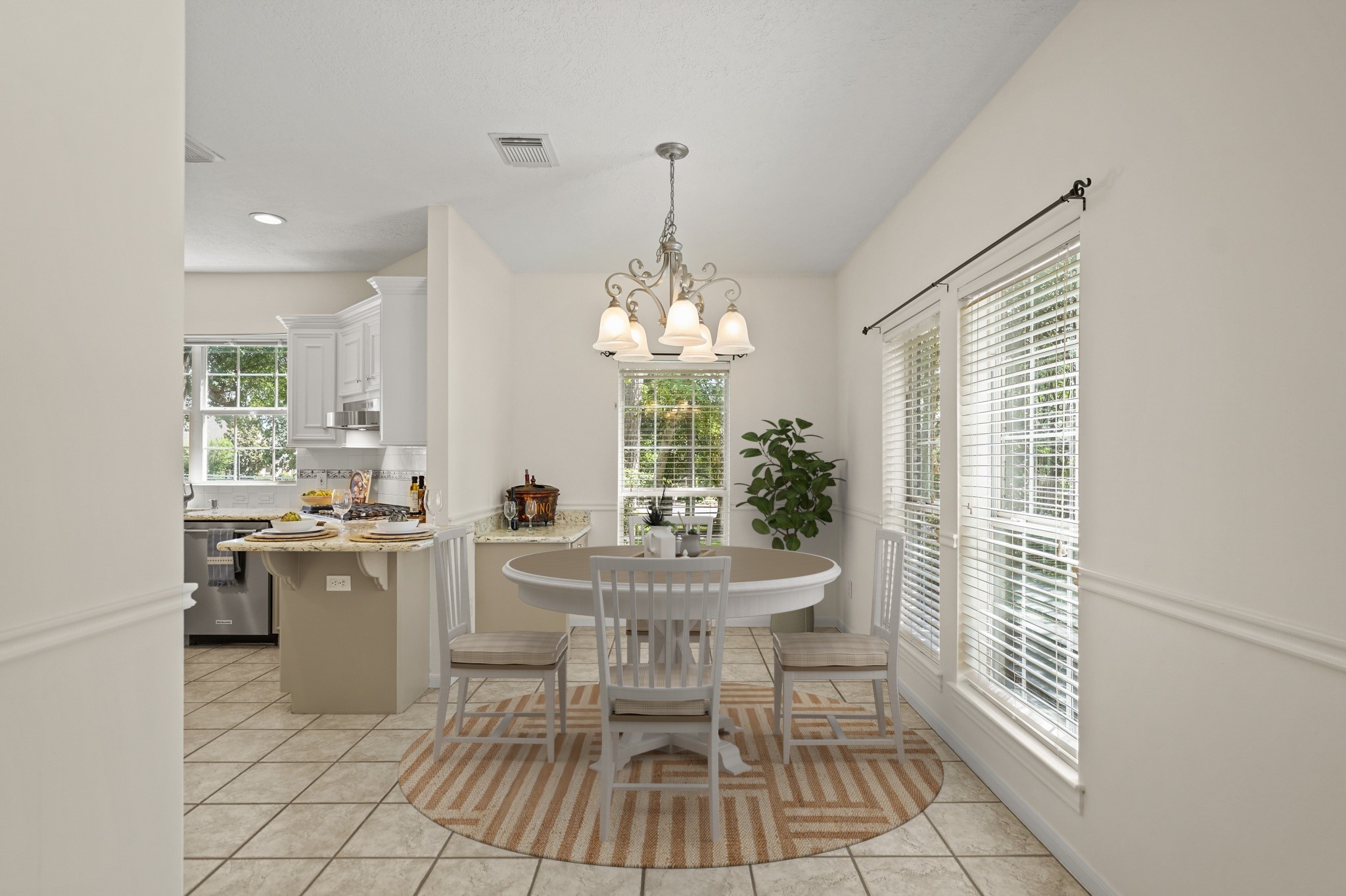 12690 Longmire Way Conroe, TX 77304 - Photo 15 of 50 a view of a dining room with furniture window and outside view