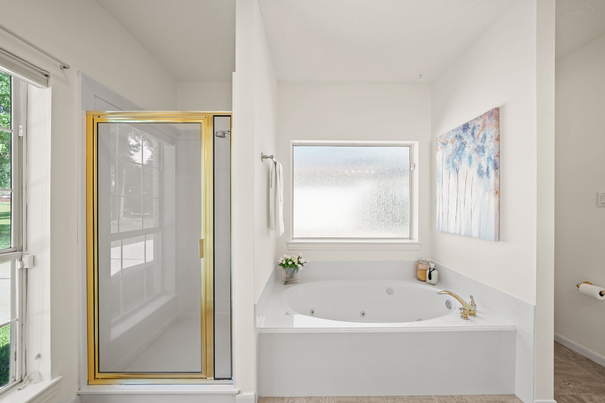 12690 Longmire Way Conroe, TX 77304 - Photo 26 of 50 a white bath tub sitting next to a shower