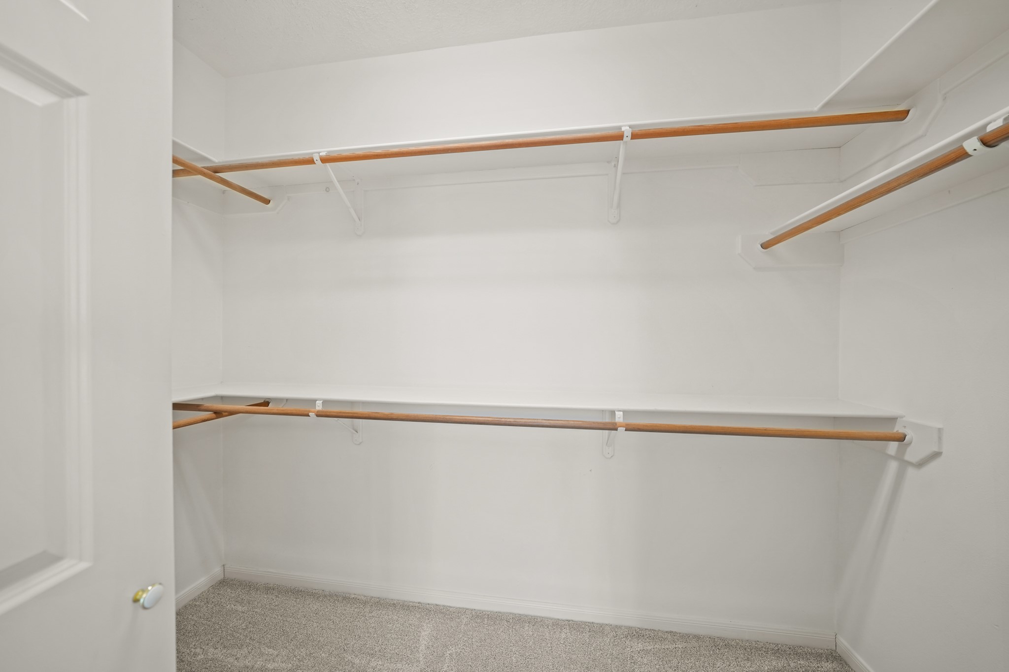 12690 Longmire Way Conroe, TX 77304 - Photo 27 of 50 a view of a room with racks on the wall