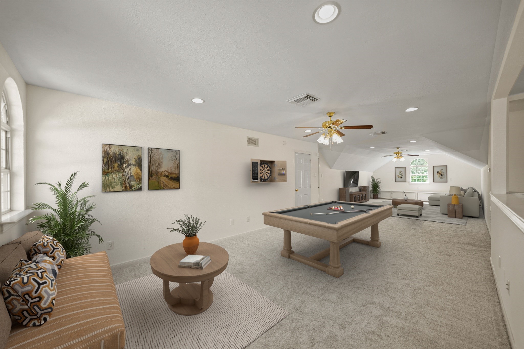 12690 Longmire Way Conroe, TX 77304 - Photo 29 of 50 a living room with furniture and a potted plant