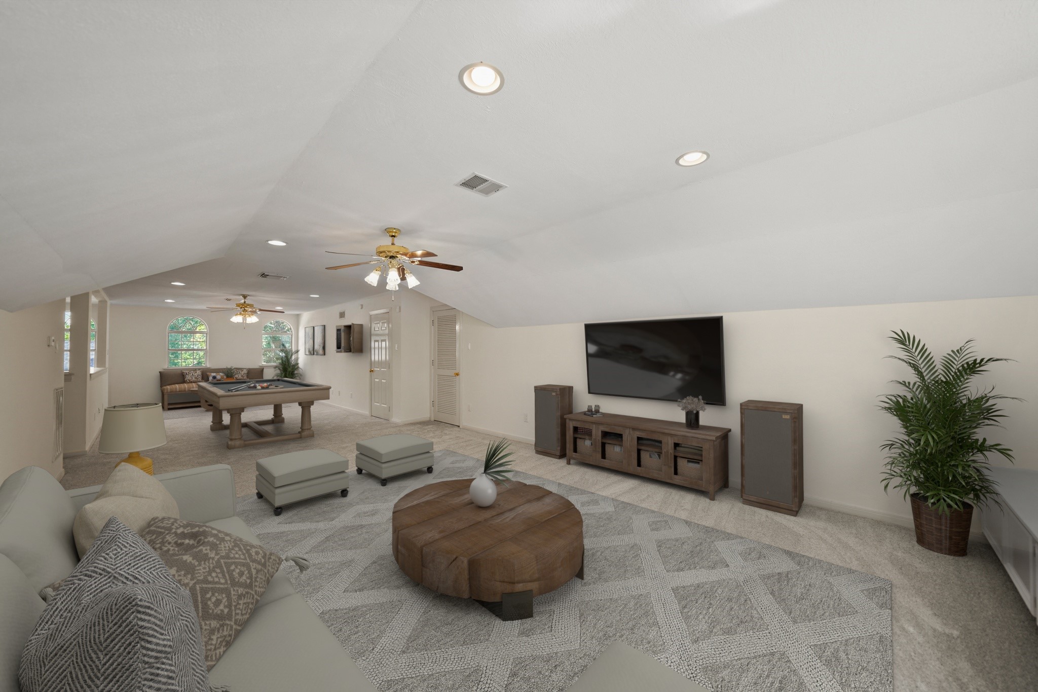 12690 Longmire Way Conroe, TX 77304 - Photo 30 of 50 a living room with furniture and a flat screen tv