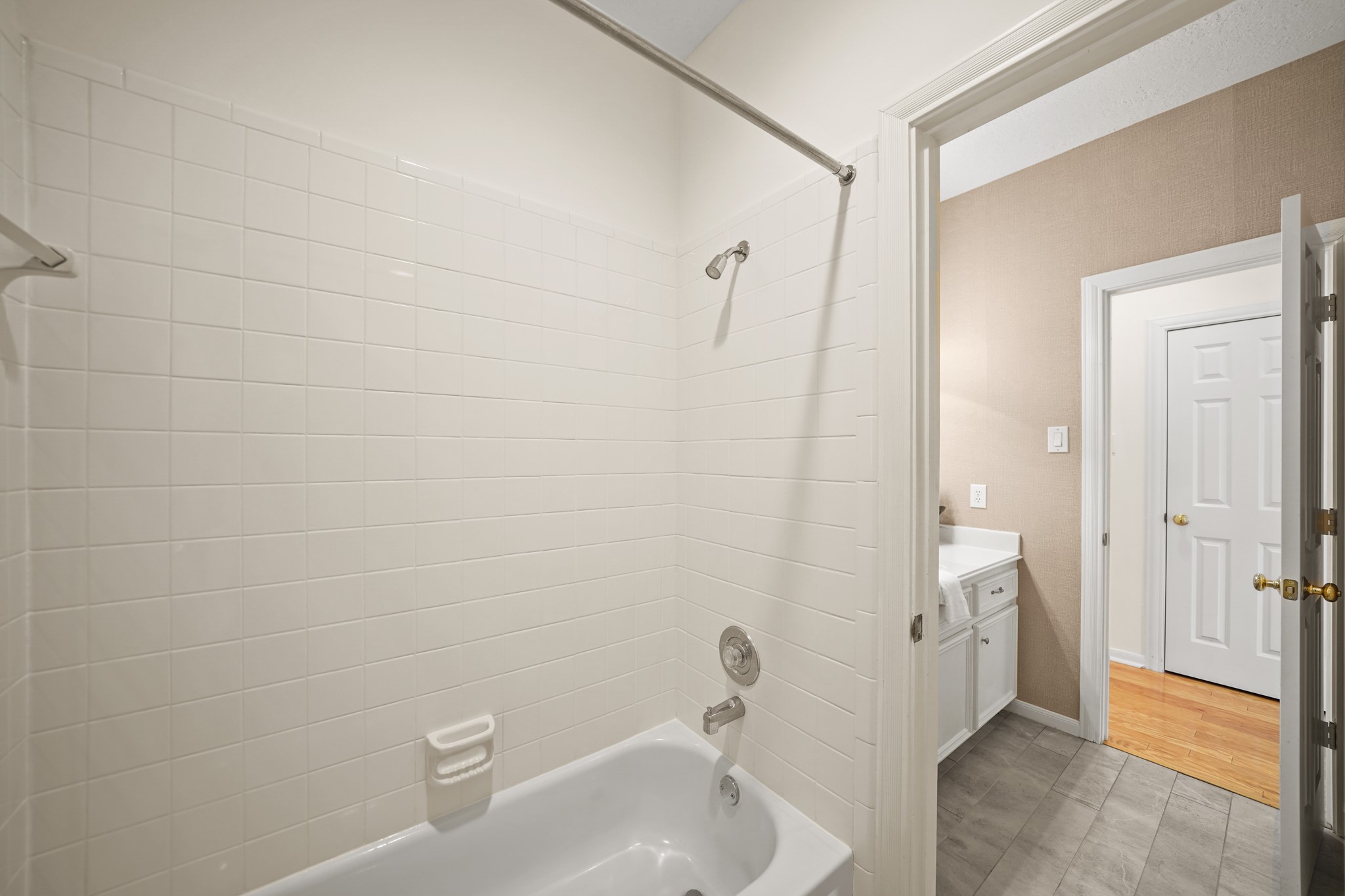 12690 Longmire Way Conroe, TX 77304 - Photo 34 of 50 a bathroom with a sink and shower