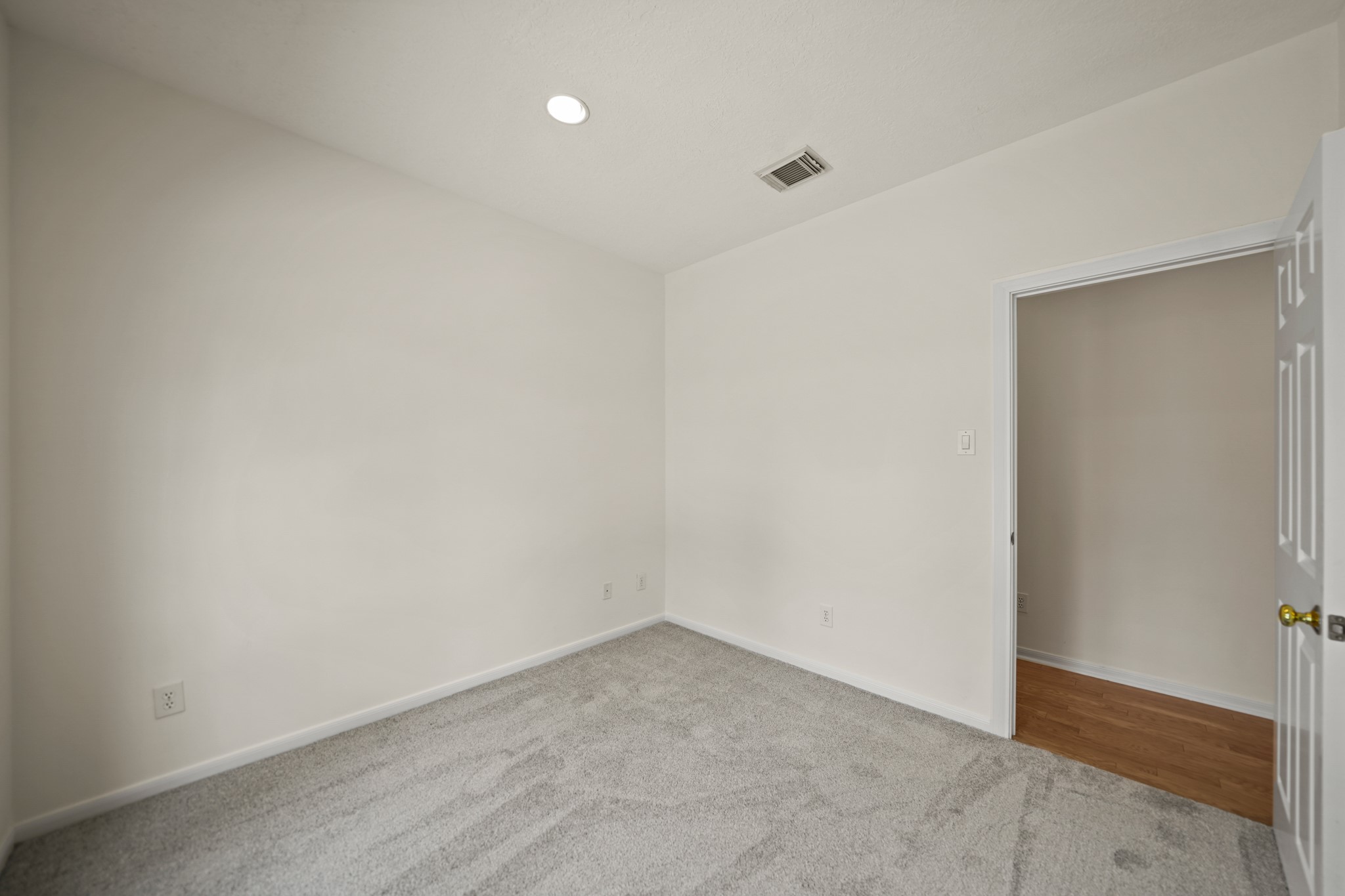 12690 Longmire Way Conroe, TX 77304 - Photo 36 of 50 Included is recessed lighting, a wardrobe storage closet & new carpet.