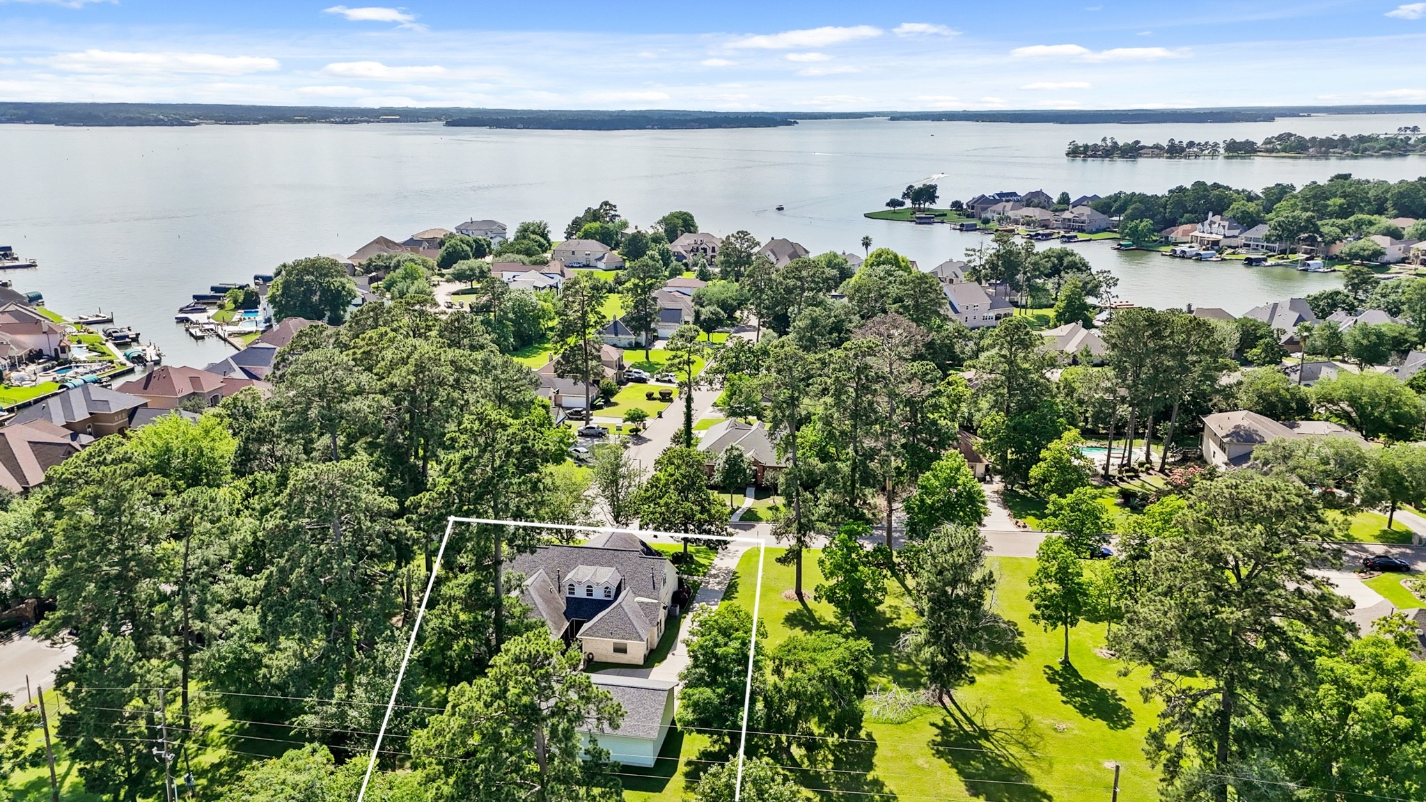 12690 Longmire Way Conroe, TX 77304 - Photo 48 of 50 Enjoy a relaxing and easy lake lifestyle boating on Lake Conroe!
