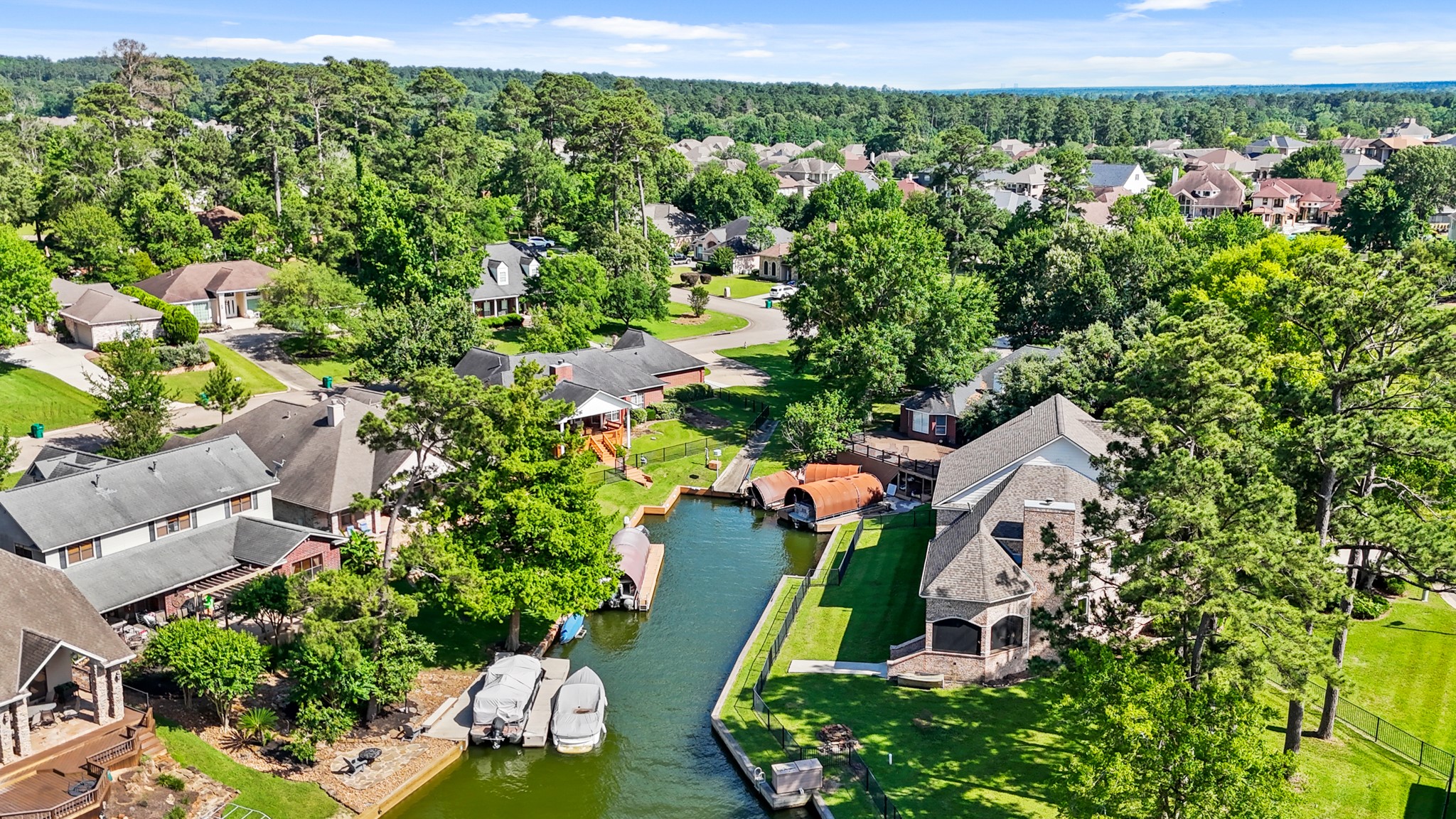 12690 Longmire Way Conroe, TX 77304 - Photo 49 of 50 an aerial view of a house with a yard