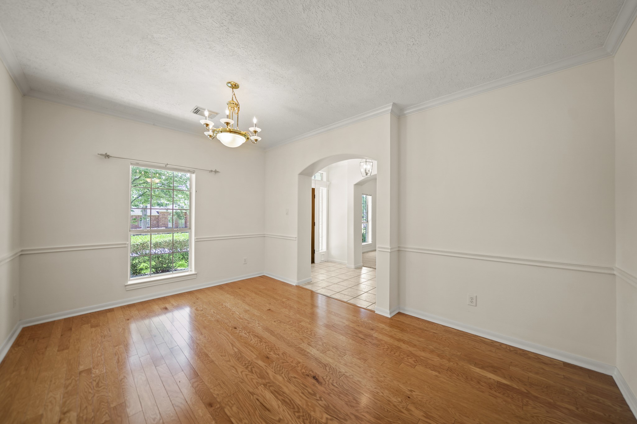 12690 Longmire Way Conroe, TX 77304 - Photo 7 of 50 a view of an empty room with a window