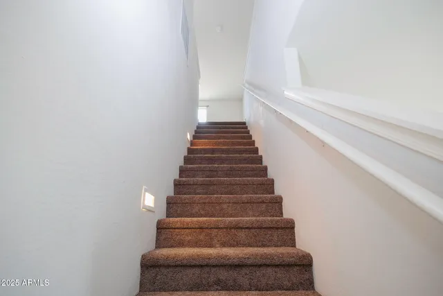 a view of a room with an empty space