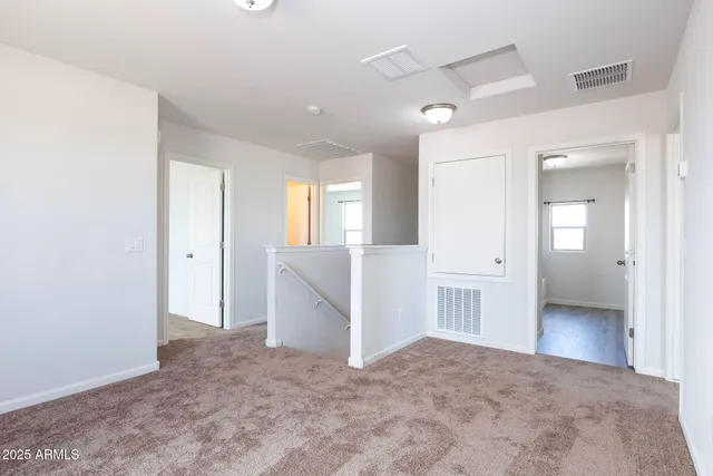 a bedroom with a bed and a walk in closet
