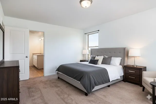 a bathroom with a granite countertop toilet a sink and a bathtub