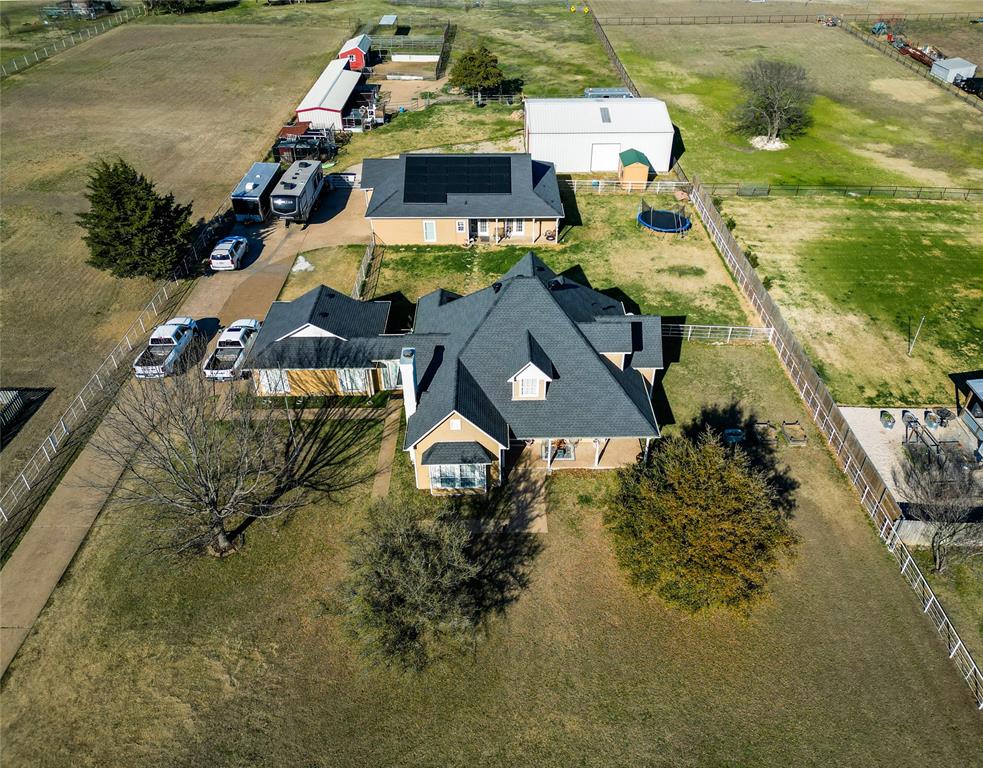 2211 Mc Alpin Road Midlothian, TX 76065 - Photo 2 of 37 an aerial view of a house with swimming pool and ocean view