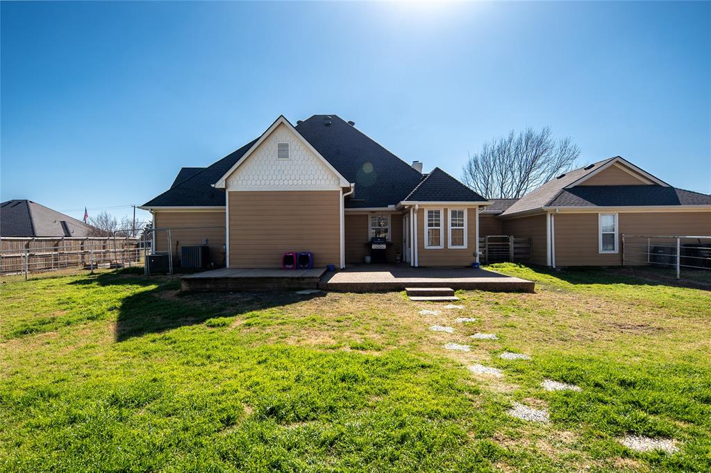 2211 Mc Alpin Road Midlothian, TX 76065 - Photo 25 of 37 a view of a house with swimming pool and a yard