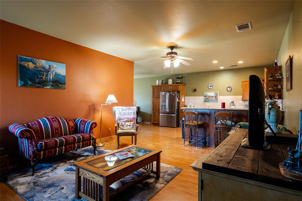 2211 Mc Alpin Road Midlothian, TX 76065 - Photo 29 of 37 a living room with furniture pool table and a flat screen tv