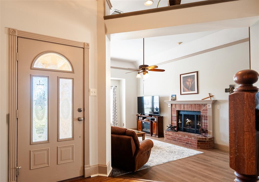 2211 Mc Alpin Road Midlothian, TX 76065 - Photo 3 of 37 a view of living room with furniture and a fireplace