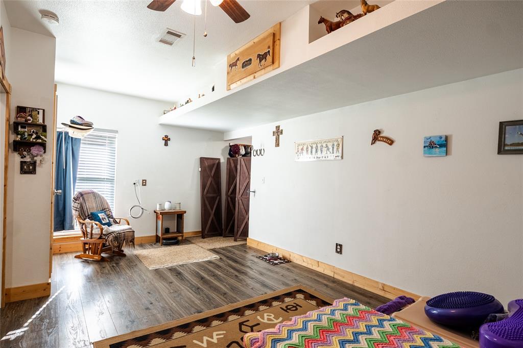 2211 Mc Alpin Road Midlothian, TX 76065 - Photo 33 of 37 a bed room with a bed and a chair