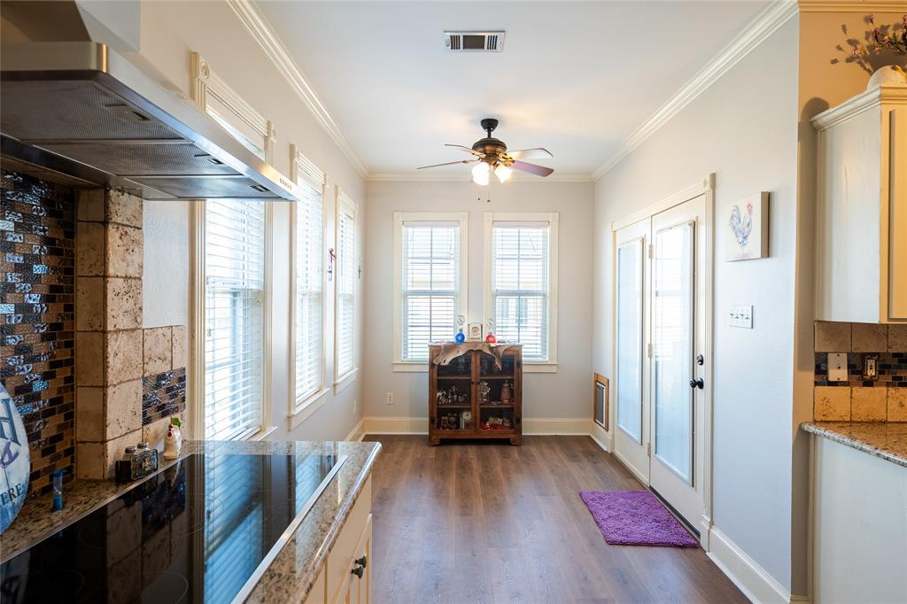 2211 Mc Alpin Road Midlothian, TX 76065 - Photo 6 of 37 a view of a livingroom with furniture hardwood floor and a window