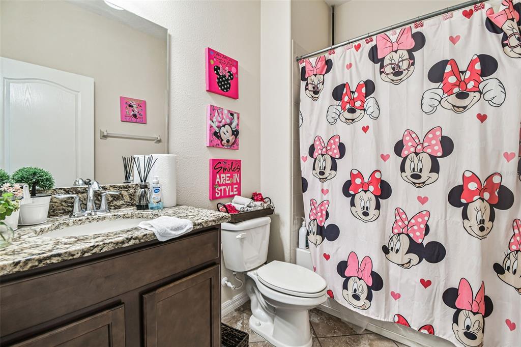 13807 Felix Will Road Riverview, FL 33579 - Photo 18 of 91 a bathroom with a sink toilet and vanity