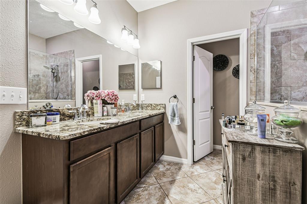 13807 Felix Will Road Riverview, FL 33579 - Photo 65 of 91 a bathroom with a granite countertop sink and a mirror