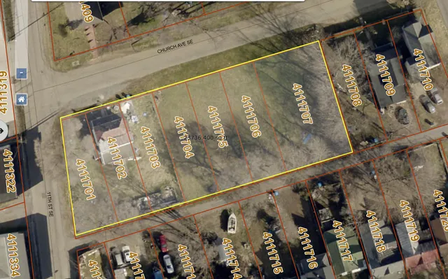 a close up of a street sign on a wall