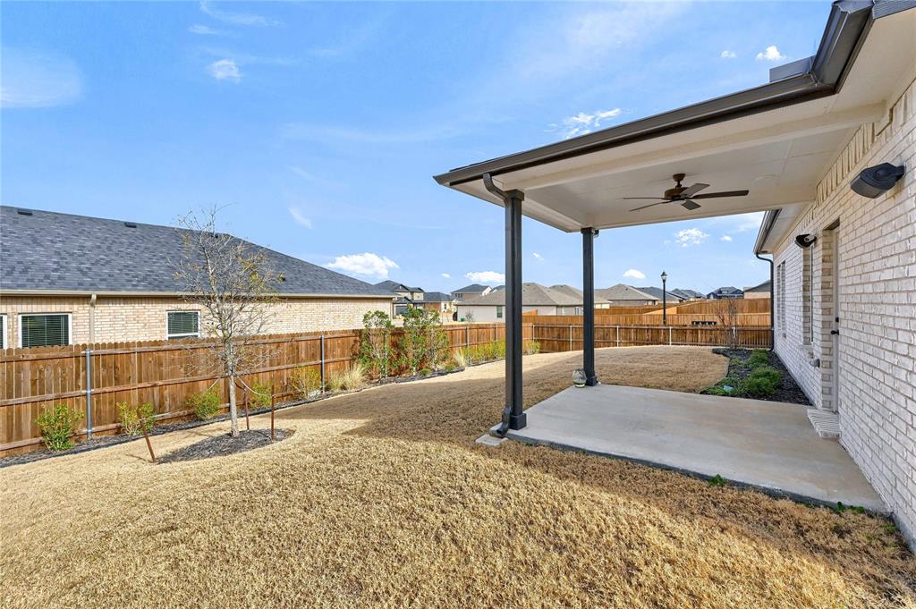 1902 Aleia Cove Sherman, TX 75092 - Photo 24 of 25 a view of a backyard