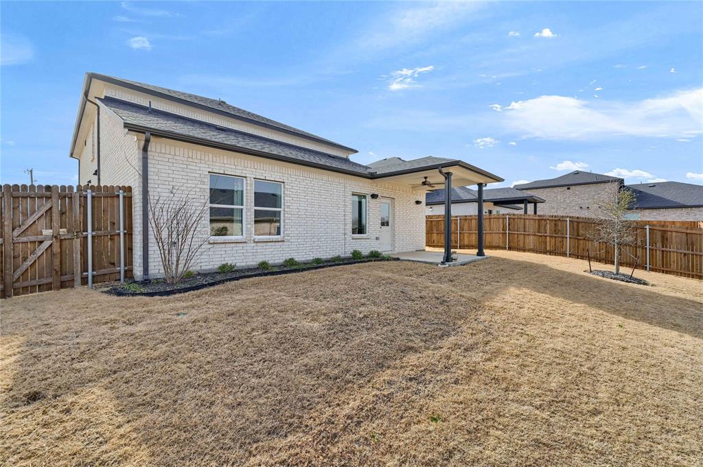 1902 Aleia Cove Sherman, TX 75092 - Photo 25 of 25 a view of a house with a yard