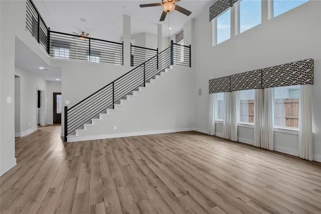 a view of entryway with wooden floor