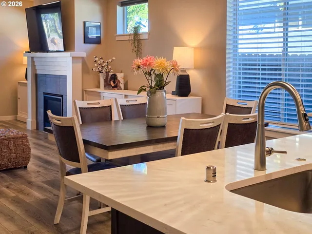 a view of kitchen with cabinets and wooden floor