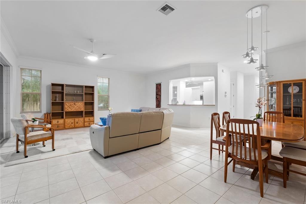5017 Maxwell Circle, Unit 4202 Naples, FL 34105 - Photo 6 of 27 Dining area and living room