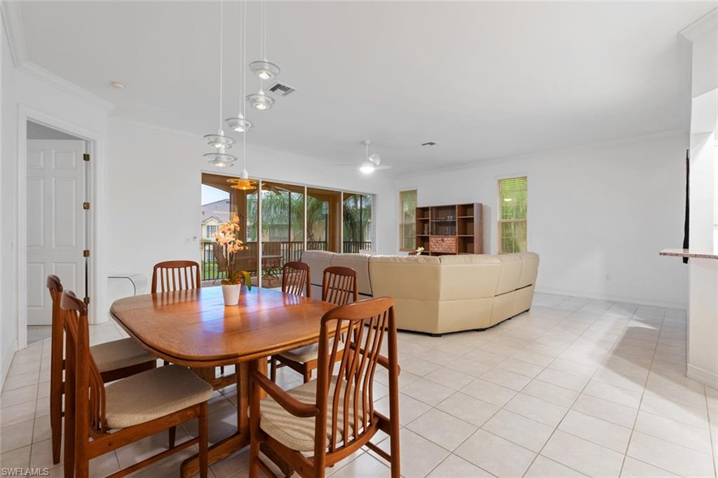 5017 Maxwell Circle, Unit 4202 Naples, FL 34105 - Photo 8 of 27 Dining area with living room in the background