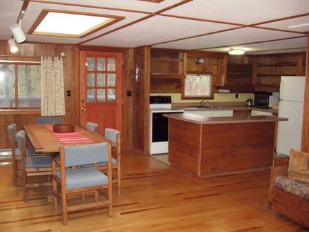 2 Partridge Way Stockbridge, MA 01262 - Photo 4 of 6 a dining hall with stainless steel appliances granite countertop a stove and a refrigerator