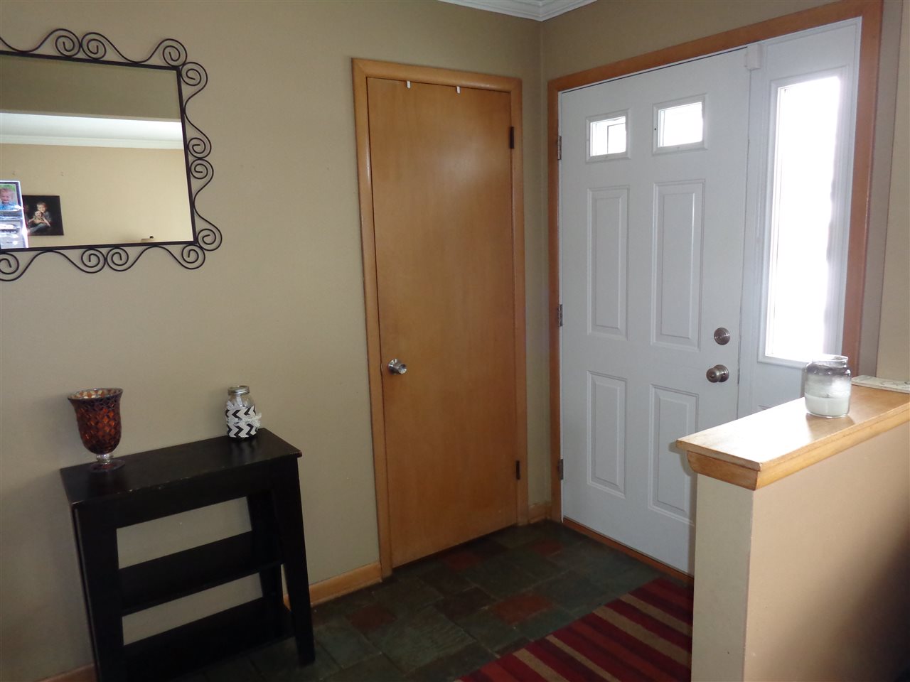5240 Welsh Road Rockford, IL 61107 - Photo 8 of 25 a bathroom with a sink a mirror and a toilet