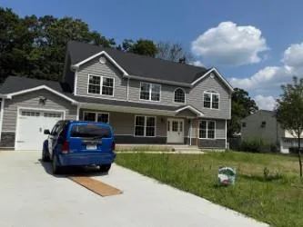 a house view with a garden space