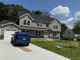 153 Calebs Path Central Islip, NY 11722 - Photo 2 of 2 a house view with a garden space
