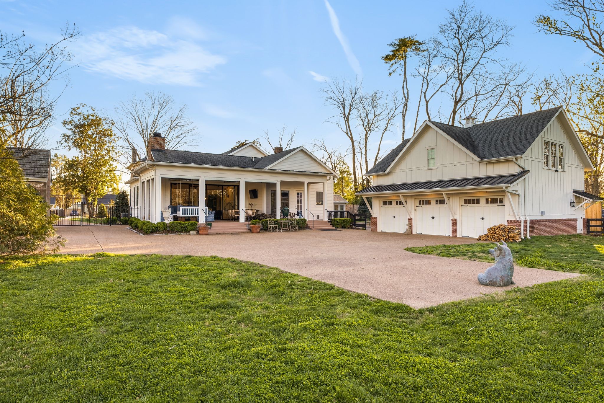 501 Murfreesboro Road Franklin, TN 37064 - Photo 70 of 83 a front view of a house with a yard and garage