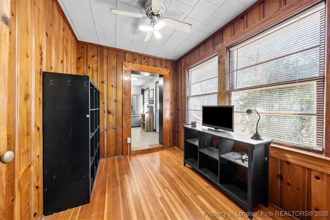 101 North Rockingham Street Robbins, NC 27325 - Photo 11 of 32 a view of a kitchen with a sink and wooden floor
