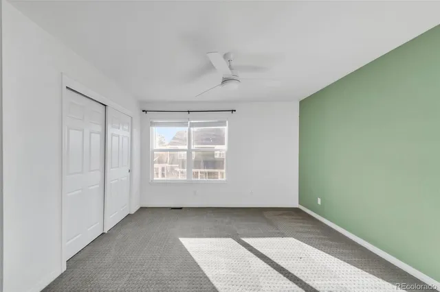 a kitchen with granite countertop a sink and a stove